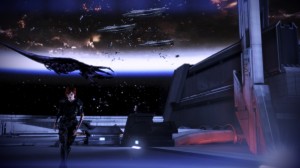 Shepard makes her decision as a Reaper does battle with vessels in the background.